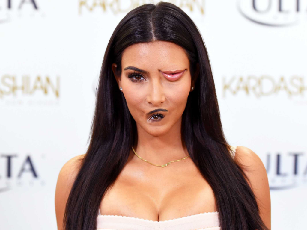 A modified image of Kim Kardashian: her left eye has been switched with her lips.